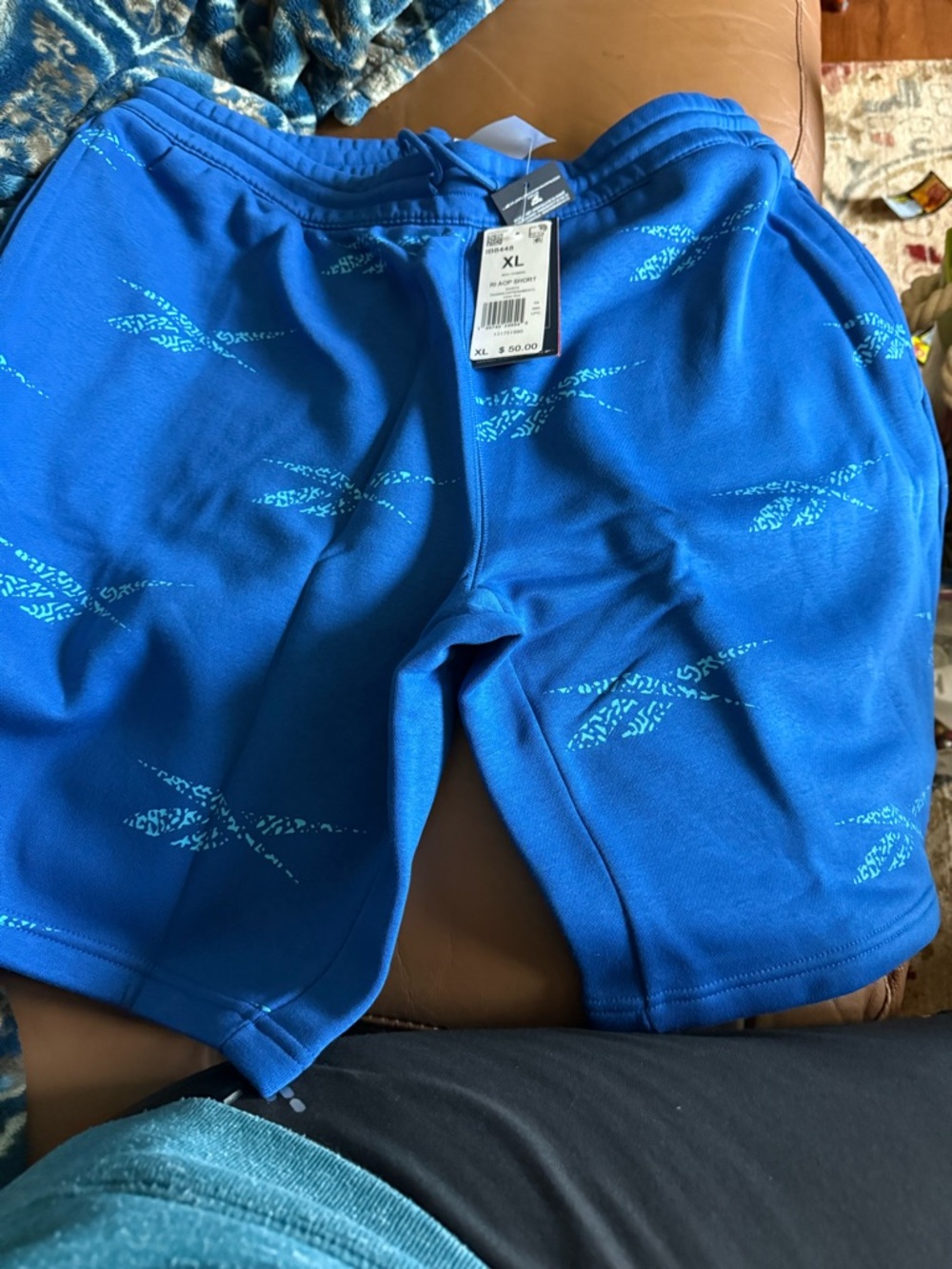 Reebok Blue Athletic Shorts with Aqua Graphic Accents